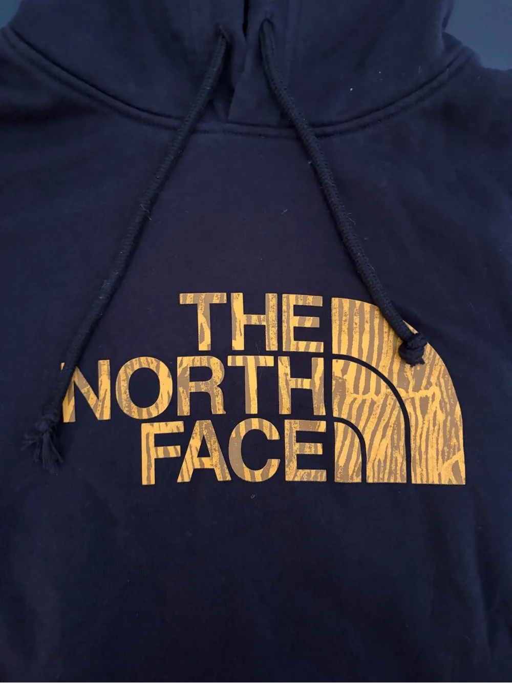 The North Face Black Hoodie with Yellow Logo